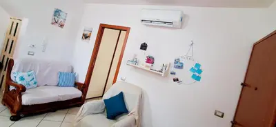 Letto o letti in una camera di Casa Silvana Relax e Mare nel cuore di Sant'Antioco