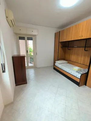 Letto o letti in una camera di Casa via Bolzano 2