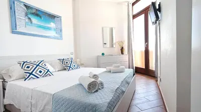 Letto o letti in una camera di Blu Mare