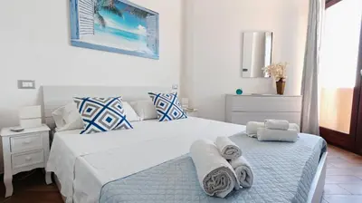 Letto o letti in una camera di Blu Mare