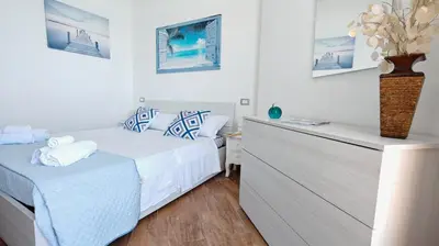 Letto o letti in una camera di Blu Mare