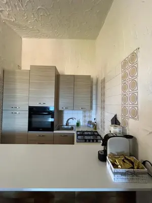 Cucina o angolo cottura di APPARTAMENTI BIANCANEVE by VILLA AUREA CAV
