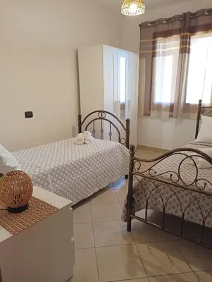 Letto o letti in una camera di Da Adry e Lodo