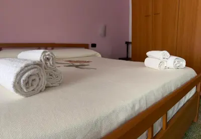 Letto o letti in una camera di Red Sunset