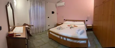 Letto o letti in una camera di Red Sunset