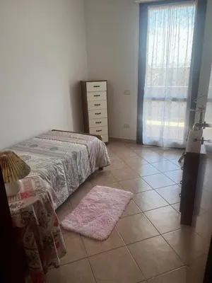 Letto o letti in una camera di Casa vacanze La Gioia