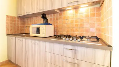 Cucina o angolo cottura di Casa l'Arco degli Ulivi - Pet Friendly