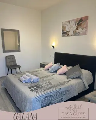 Letto o letti in una camera di Casa Gurys