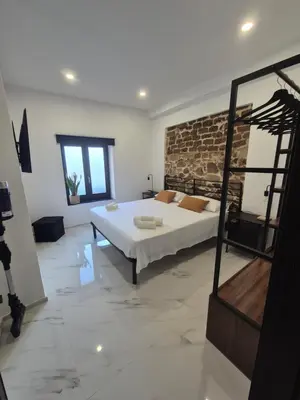 Letto o letti in una camera di The Stone Loft Cuccureddu