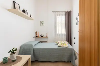 Letto o letti in una camera di Terrazza Hikari Villacidro