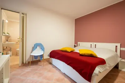 Letto o letti in una camera di L'Arco nel Corso