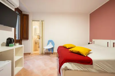 Letto o letti in una camera di L'Arco nel Corso