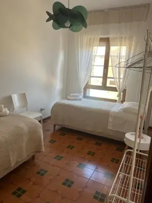 Letto o letti in una camera di Il Meriggio