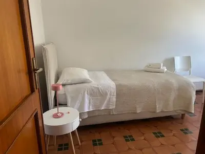 Letto o letti in una camera di Il Meriggio