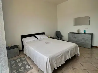 Letto o letti in una camera di Casa Oristano Mare & Citta' bis