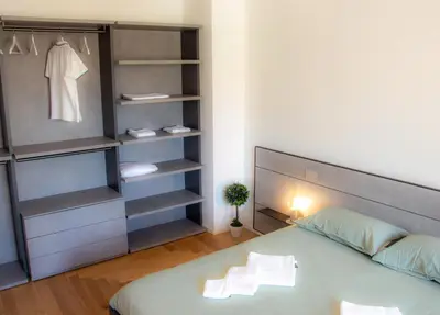 Letto o letti in una camera di Casa Margherita