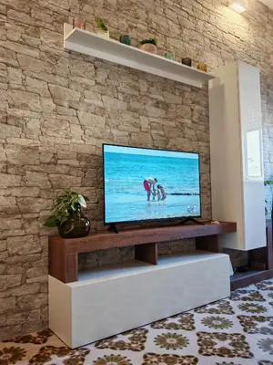 TV o dispositivi per l'intrattenimento presso Dino Domus apartment