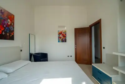 Letto o letti in una camera di terrazza paradiso