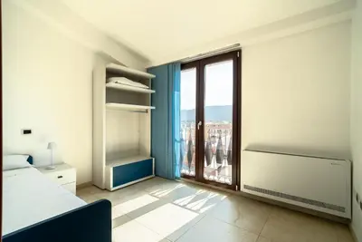 Letto o letti in una camera di terrazza paradiso