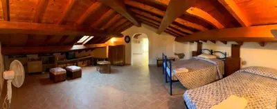 Letto o letti in una camera di Villa Iole