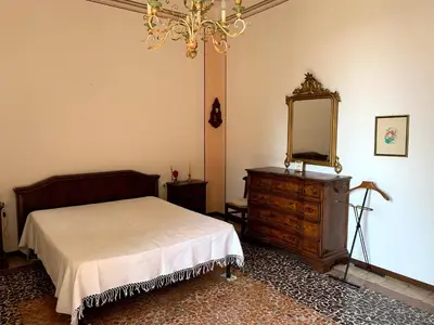 Letto o letti in una camera di Villa Iole
