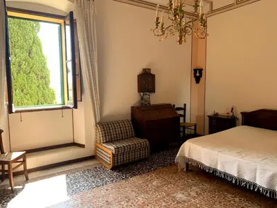 Letto o letti in una camera di Villa Iole