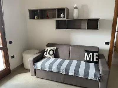 Area soggiorno di Flamingo Apartment
