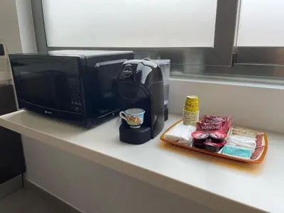 Set per la preparazione di tè e caffè presso Flamingo Apartment