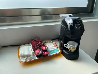 Set per la preparazione di tè e caffè presso Flamingo Apartment