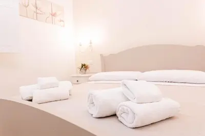 Letto o letti in una camera di Casa Midò