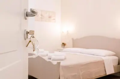 Letto o letti in una camera di Casa Midò