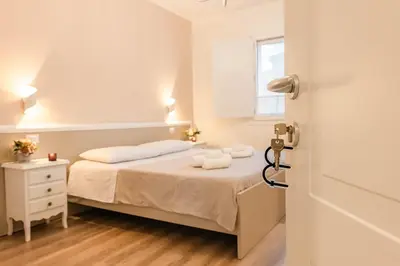 Letto o letti in una camera di Casa Midò