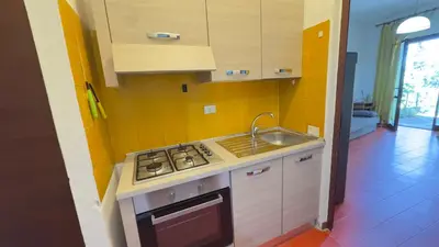Cucina o angolo cottura di Villetta Pinus Village