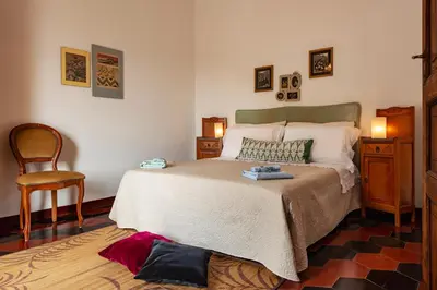 Letto o letti in una camera di Casa Boi tra montagna e mare