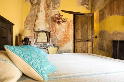 Letto o letti in una camera di Su Cuccumeu
