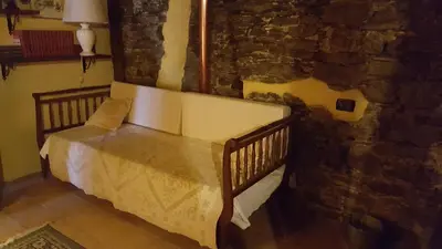 Letto o letti in una camera di Su Cuccumeu