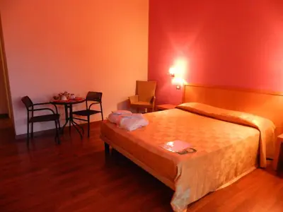 Letto o letti in una camera di Hotel I Colori