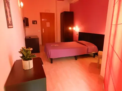 Letto o letti in una camera di Hotel I Colori