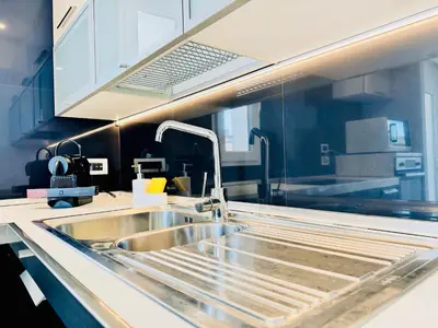 Cucina o angolo cottura di Blu Mare Pregiata Villa con terrazza vista mare