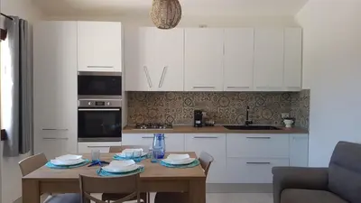 Cucina o angolo cottura di APPARTAMENTO LA DUNA - CASA sulla SPIAGGIA