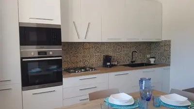 Cucina o angolo cottura di APPARTAMENTO LA DUNA - CASA sulla SPIAGGIA