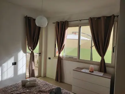 Letto o letti in una camera di Domomia