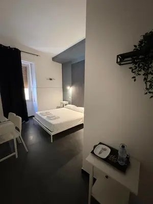 Letto o letti in una camera di La cittadella rooms 2