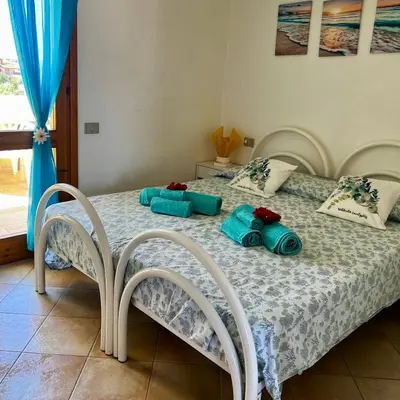 Letto o letti in una camera di Villa bella
