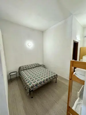 Letto o letti in una camera di Casa Nala Costa Rei