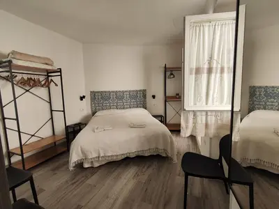 Letto o letti in una camera di Apartment 1 Il Giardino Segreto