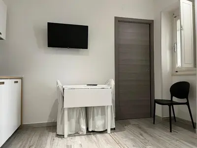 TV o dispositivi per l'intrattenimento presso Apartment 1 Il Giardino Segreto