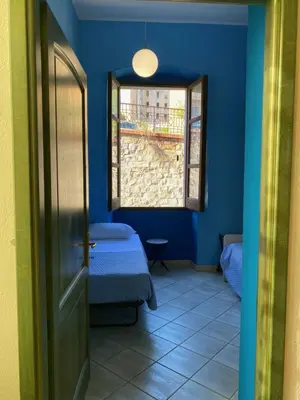 Letto o letti in una camera di Central-Guest-House