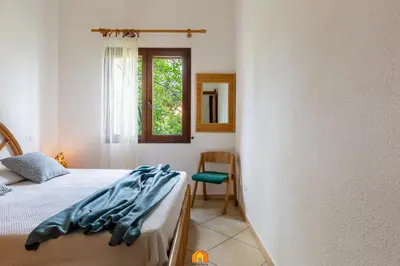 Letto o letti in una camera di Villa Ferula