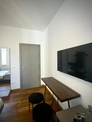 TV o dispositivi per l'intrattenimento presso Luxenti Luxury Rooms